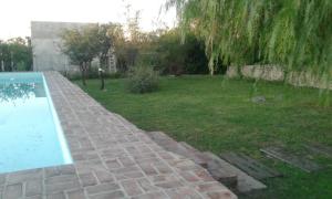 a view of a yard with a swimming pool at La Ecle in San Javier