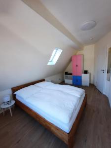 Postel nebo postele na pokoji v ubytování Ferienwohnung Mühlennest