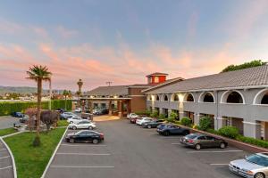 arial view of a hotel with cars parked in a parking lot at Best Western Plus Brookside Inn in Milpitas