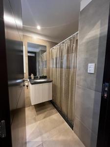 a bathroom with a sink and a shower at FIRENZE in Rosario