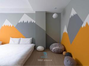 Voodi või voodid majutusasutuse 木可木可-包棟民宿 toas