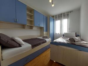 Posteľ alebo postele v izbe v ubytovaní Apartment Crikva