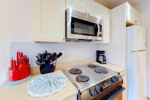A kitchen or kitchenette at Seascape Garden Villas 18B