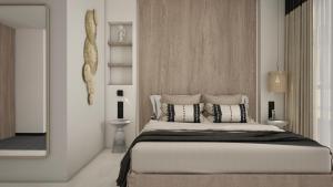 a bedroom with a large bed and a mirror at M. HOTEL in San Antonio