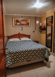 Ένα ή περισσότερα κρεβάτια σε δωμάτιο στο Di Giorgio Hostal