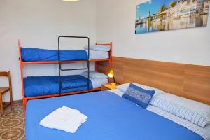 Postel nebo postele na pokoji v ubytování Peaceful flat with direct beach access Beahost
