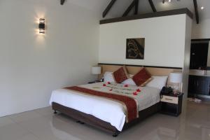 Letto o letti in una camera di Lander's Bay Resort