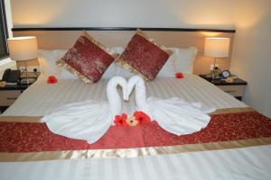 Letto o letti in una camera di Lander's Bay Resort