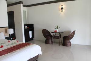 Letto o letti in una camera di Lander's Bay Resort