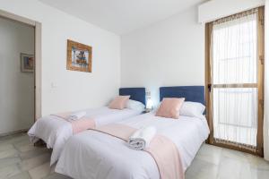 Posteľ alebo postele v izbe v ubytovaní Apartamento La Pampa