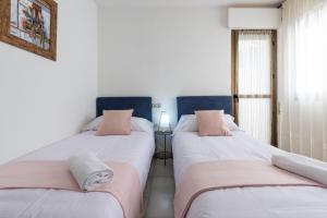 Posteľ alebo postele v izbe v ubytovaní Apartamento La Pampa