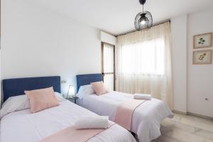 Posteľ alebo postele v izbe v ubytovaní Apartamento La Pampa