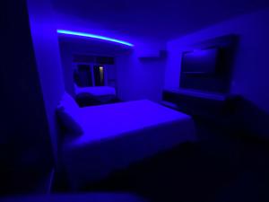 Postel nebo postele na pokoji v ubytování Motel Encuentro