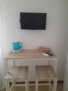 TV a/nebo společenská místnost v ubytování La dimora felice