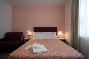 Ένα ή περισσότερα κρεβάτια σε δωμάτιο στο Residence Villa Frio Frio +12 φωτογραφίες