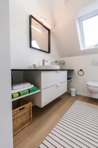 Bagno di Appartement HIMMEL & Höllerl