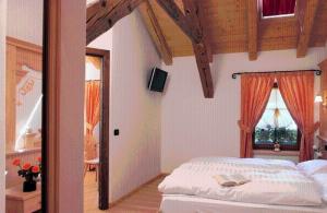 Postel nebo postele na pokoji v ubytování Hotel Fonte Dei Veli