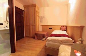 Postel nebo postele na pokoji v ubytování Hotel Fonte Dei Veli