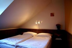 Posteľ alebo postele v izbe v ubytovaní Hotel Floret
