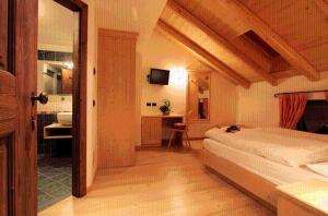 Postel nebo postele na pokoji v ubytování Hotel Fonte Dei Veli
