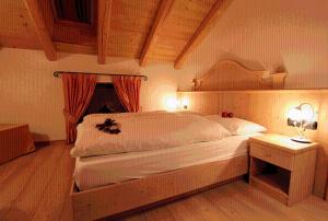 Postel nebo postele na pokoji v ubytování Hotel Fonte Dei Veli
