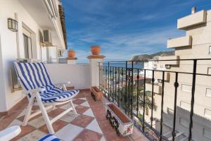 A balcony or terrace at Real View Beach Front