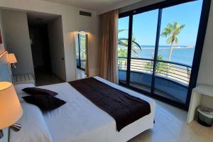 Llit o llits en una habitació de Hotel Miami Mar