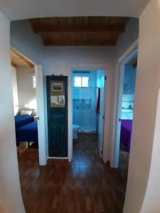 Postel nebo postele na pokoji v ubytování CASA LA LUNA