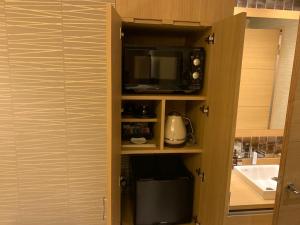 Kuchyň nebo kuchyňský kout v ubytování hotel brattostay ホテル ブラットステイ + 30 fotografií