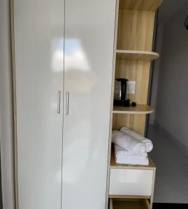 Postel nebo postele na pokoji v ubytování Thiên Thanh Hotel