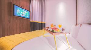 TV a/nebo společenská místnost v ubytování Oum Palace Hotel & Spa