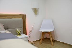 Postel nebo postele na pokoji v ubytování Civico Sedici Suite & Spa
