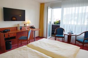 TV o dispositivi per l'intrattenimento presso AVALON Hotelpark Königshof