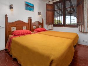 Postel nebo postele na pokoji v ubytování Holiday Home Cala Vista by Interhome