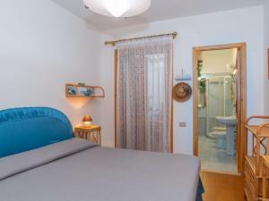 Cama o camas de una habitación en Apartment Casa Casu by Interhome