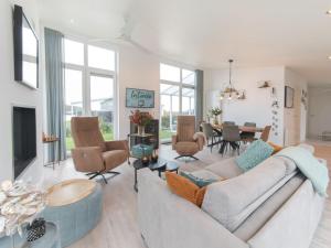 Posezení v ubytování Holiday Home Vakantiehuis Ruisweg 34 by Interhome