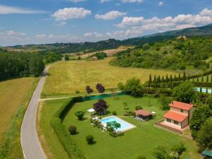 an aerial view of a estate with a swimming pool and a house at Holiday Home Il Fienile del Casolare by Interhome in Penna +26 photos