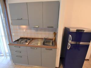 Kuchyňa alebo kuchynka v ubytovaní Apartment Simma-13 by Interhome