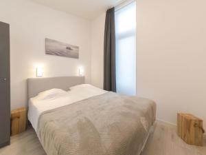 Postel nebo postele na pokoji v ubytování Holiday Home Vakantiehuis Ruisweg 18A by Interhome