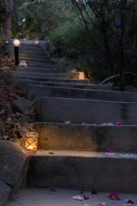 a set of concrete stairs with a candle on them at Thulamela Couples Retreat in Hazyview