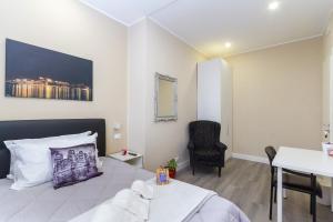 Postel nebo postele na pokoji v ubytování Exclusive Room Arena Inalpi 'La casa di Bertino'