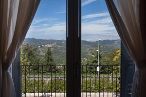 a view from a balcony of a house at Residence Fiesole in Fiesole