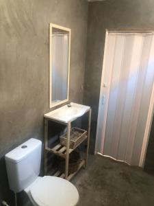 Ένα μπάνιο στο Suíte as Prainhas do Pontal do Atalaia