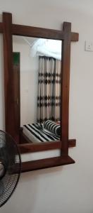 Postel nebo postele na pokoji v ubytování Nethanya Homestay