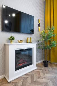 Telewizja i/lub zestaw kina domowego w obiekcie Glamorous Apartment Old Town Cracow