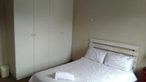 Postel nebo postele na pokoji v ubytování Uyolo Guest Logde