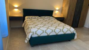 Postel nebo postele na pokoji v ubytování B&B Mercadante
