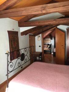 Postel nebo postele na pokoji v ubytování Suite Attico con Altana