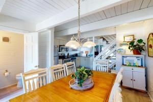 a kitchen and dining room with a table and chairs at Sea Splash 2 in Ocean City