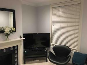 Et tv og/eller underholdning på Pier Road Holiday Home